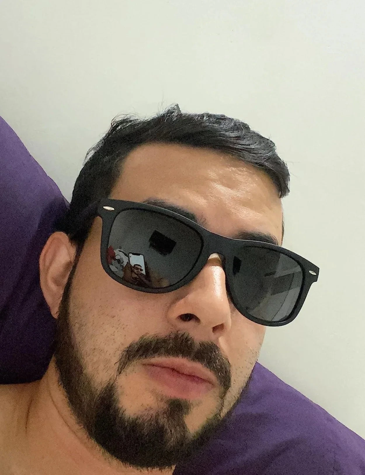 Client portant les Sur-Lunettes Polarisées